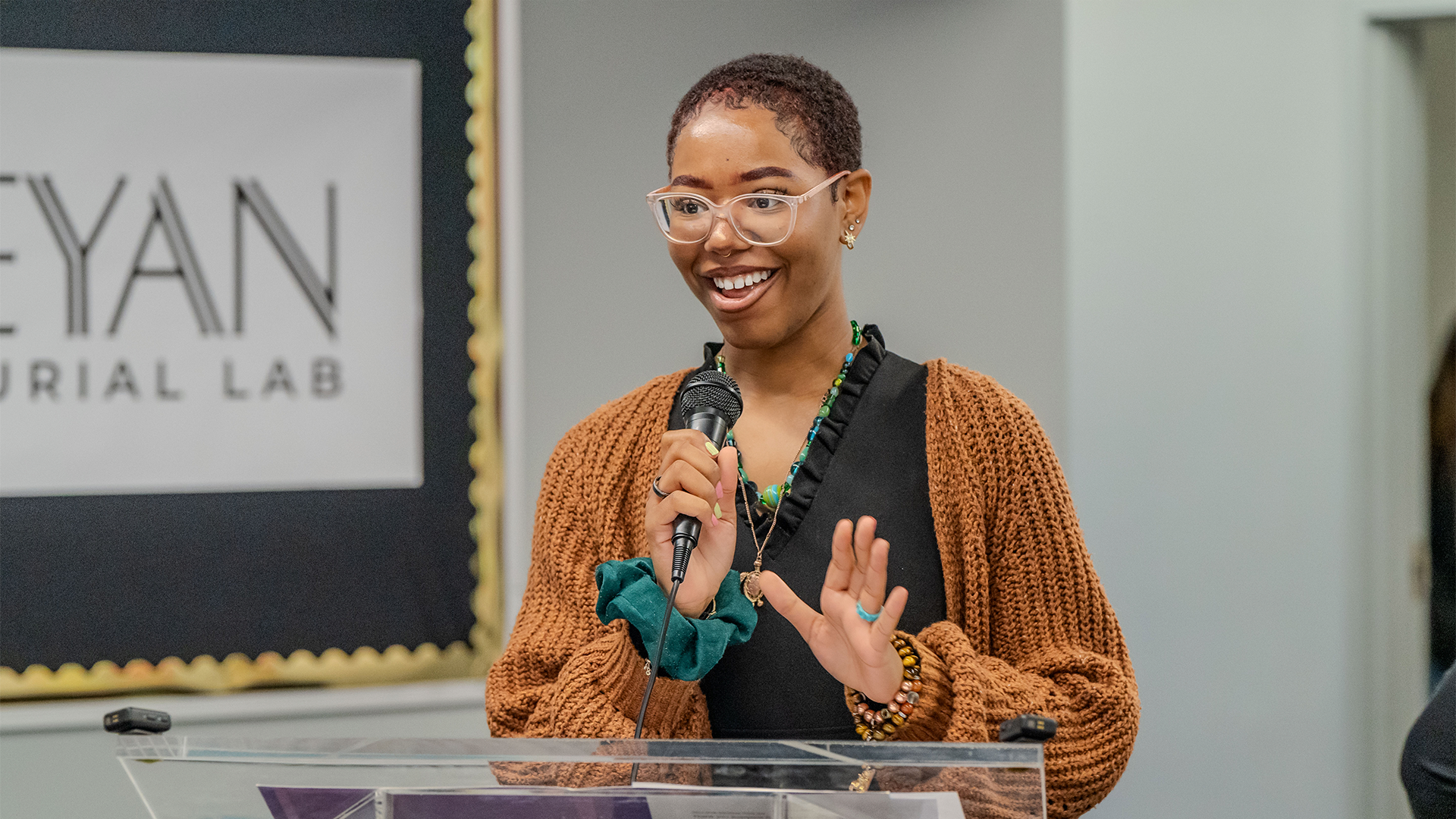 Leadership Skills Female student giving a speech at a podium